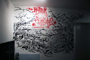 Fresque réalisée au pinceau en tracé direct sur mur d'appartement, inspirée des gravures représentant une scène de bataille épique